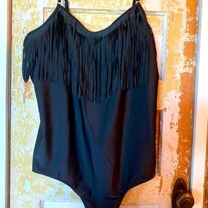 Black woman's fringe one piece bathing suit.